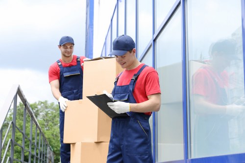 Local removals team loading furniture near Westbrompton
