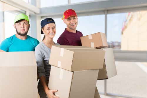 Moving boxes and furniture prepared for a West Brompton relocation