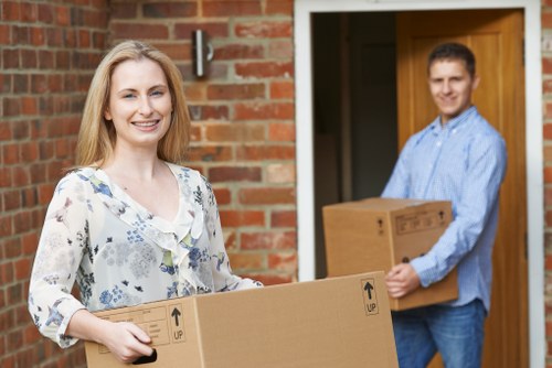 A professional removals team handling belongings in West Brompton