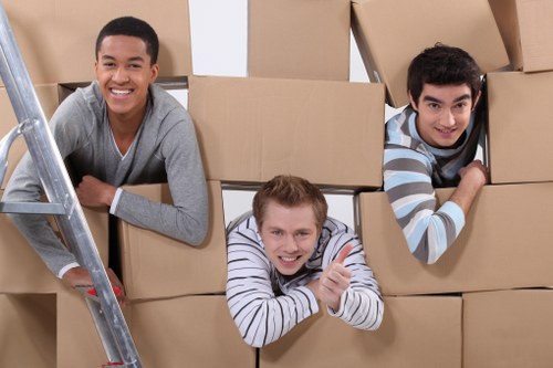 Packed boxes and furniture ready for transport in a Westbrompton flat
