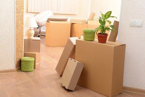 Professional movers loading furniture for a local Westbrompton relocation