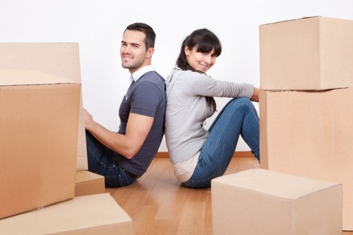 Organised moving boxes and labels ready for a Westbrompton relocation